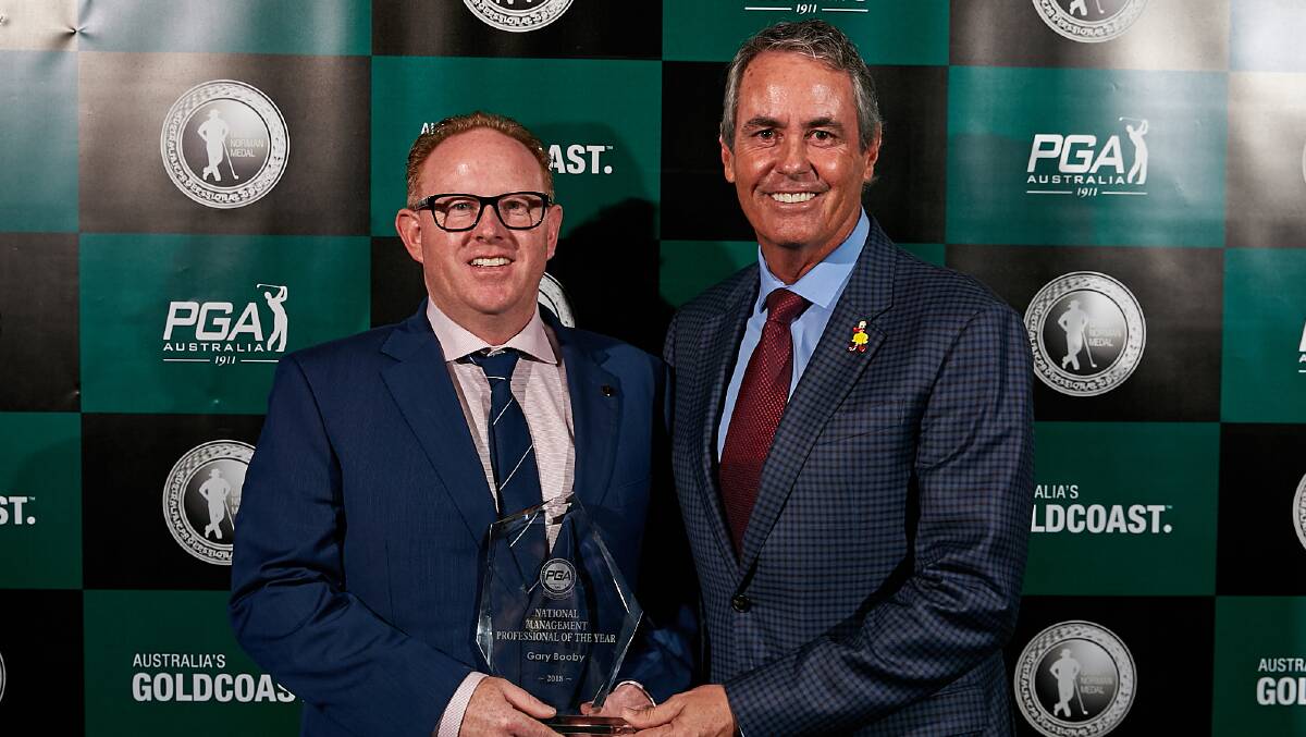 Gary Booby (left) is presented his PGA of Australia award by Ian Baker-Finch. Picture: Supplied