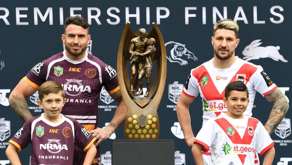 Game faces: Gareth Widdop (right) with Broncos skipper Darius Boyd at the NRL finals series launch at Allianz Stadium on Monday. Picture: AAP