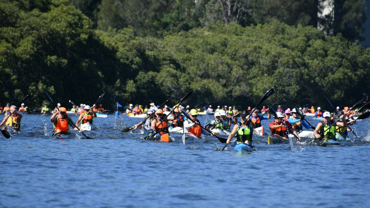 On again: Paddlers take to the Woronora River as part of the Paddle NSW Marathon Series in 2017. Picture: Rupinder Basi