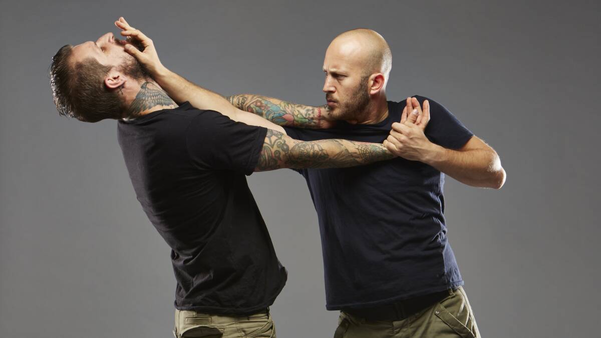 Self defence: Krav Maga Defence Institute founder Ron Engelman (right) in action. Picture: Supplied