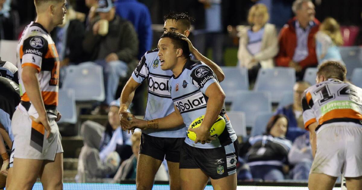 Hungry young Sharks: Cronulla thrashed the Wests Tigers 84-6 in the NYC on Saturday night. Picture: Chris Lane