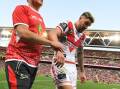 Photos | Pressure on Rabbitohs as depleted Dragons show their heart