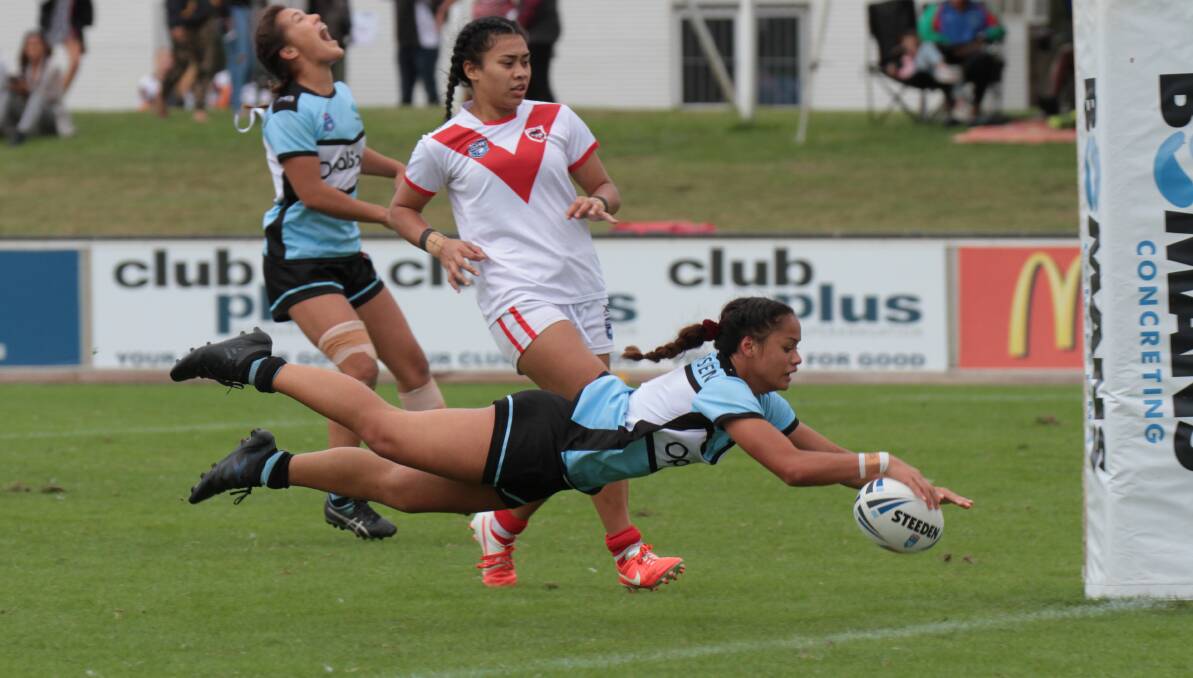 Star effort: Faith Nathan scores one of her five tries in Cronulla's Tarsha Gale Cup preliminary final win over St George. Picture: Cronulla Sharks