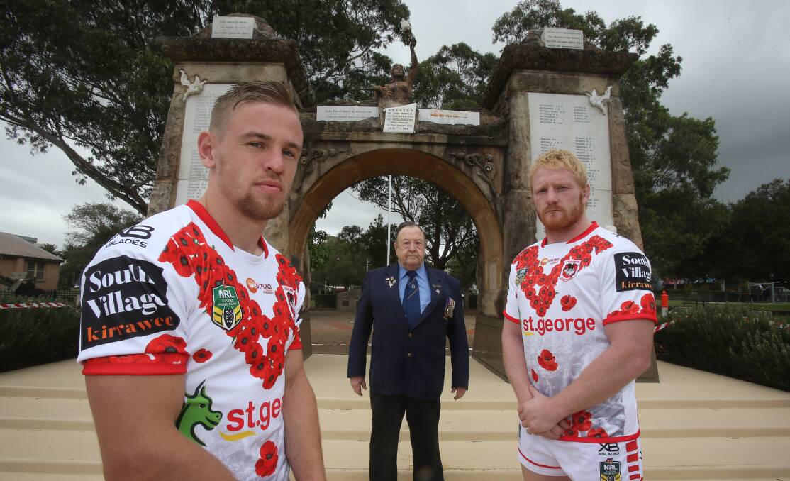 Matt Dufty (left) with Doug Johnston (centre) and James Graham at the Cenotaph in Wollongong. Picture: Robert Peet