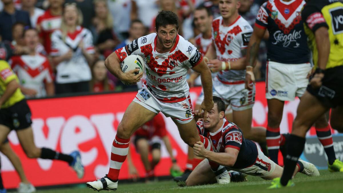 Try time: Dragons halfback Ben Hunt crosses for St George Illawarra's second try against the Roosters. Picture: John Veage