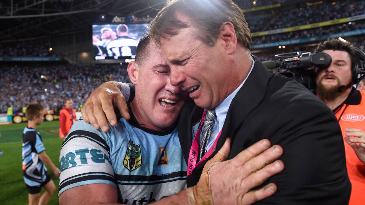 Special day: Sharks captain Paul Gallen and club legend Andrew Ettingshausen embrace after the 2016 grand final. Picture: Paul Miller/AAP Image