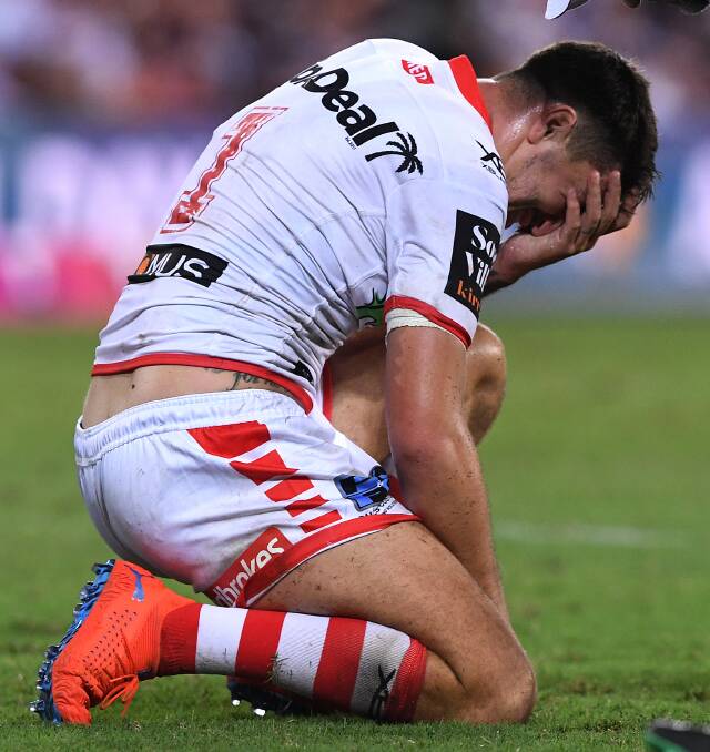 Devastated: Dragons captain Gareth Widdop in the moments after suffering another dislocated shoulder in Brisbane last month. Picture: AAP Image