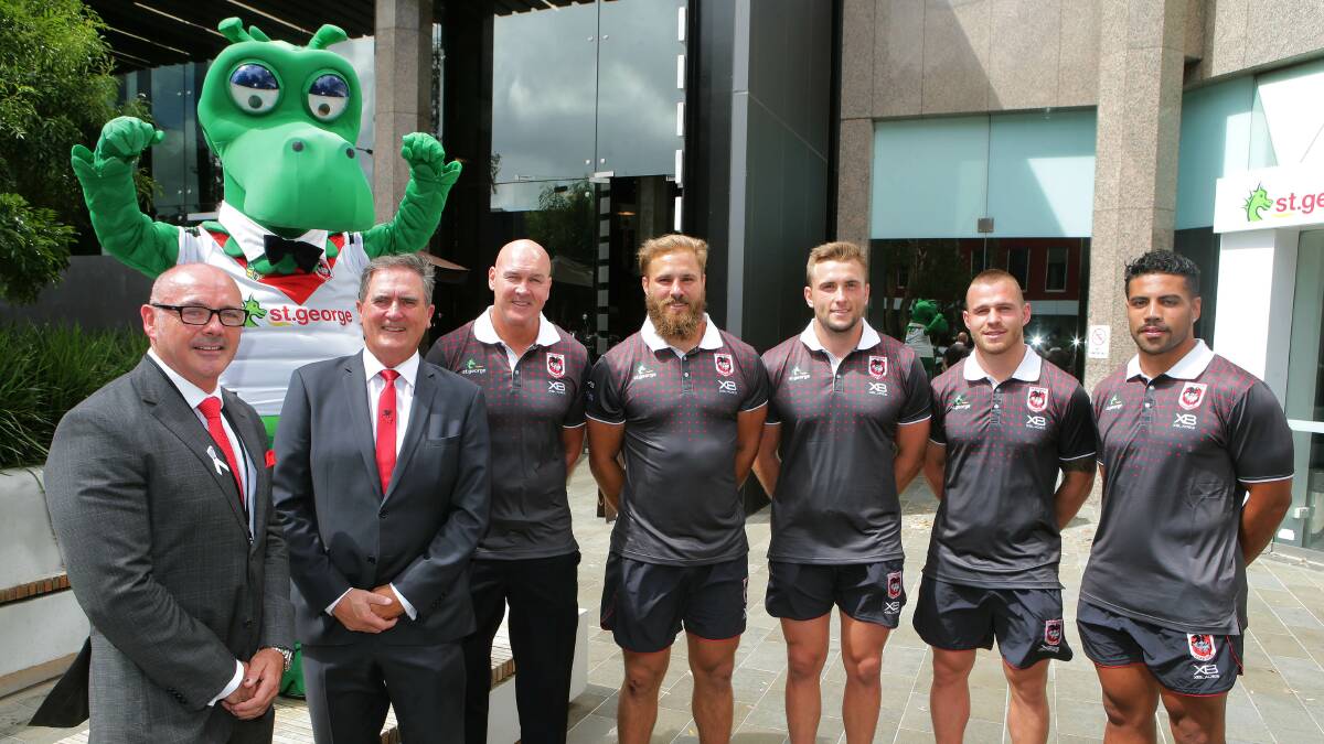 Marching together: (From left) St George Bank general manager Ross Miller, Dragons CEO Peter Doust, coach Paul McGregor and players Jack de Belin, Jacob Host, Euan Aitken and Hame Sele. Picture: John Veage