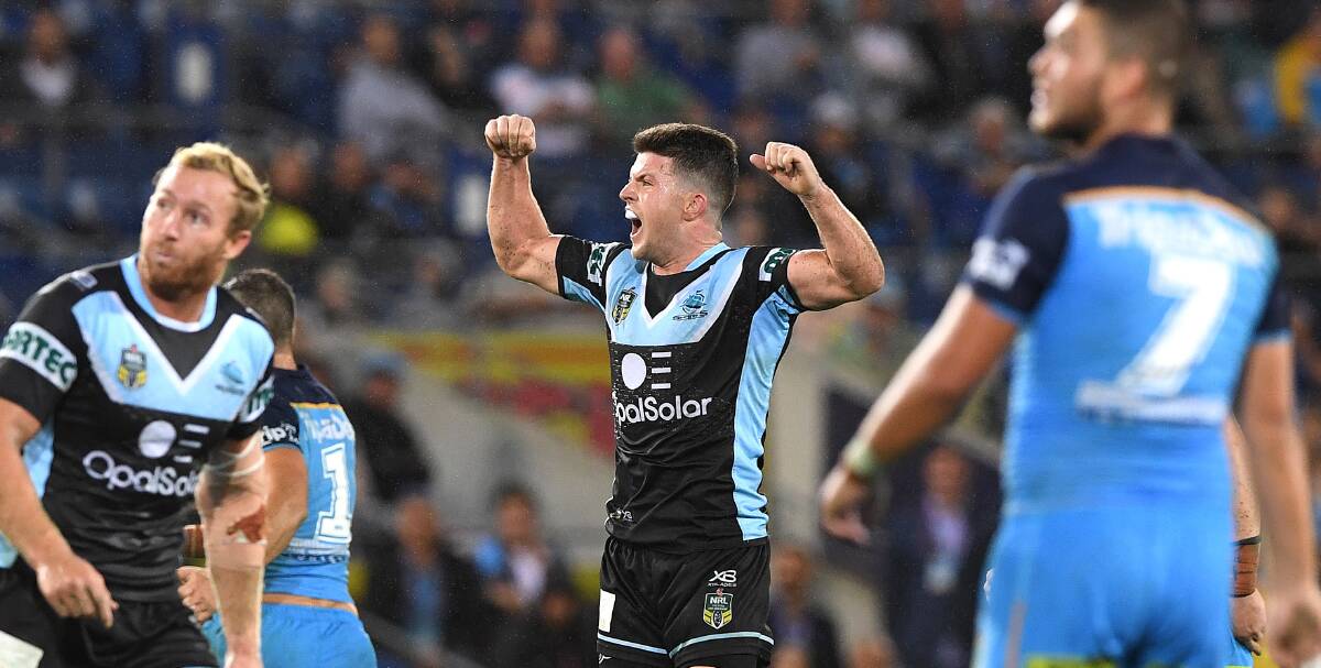 The man: Sharks halfback Chad Townsend nails the match-winning field goal against the Gold Coast on Saturday night. Picture: AAP