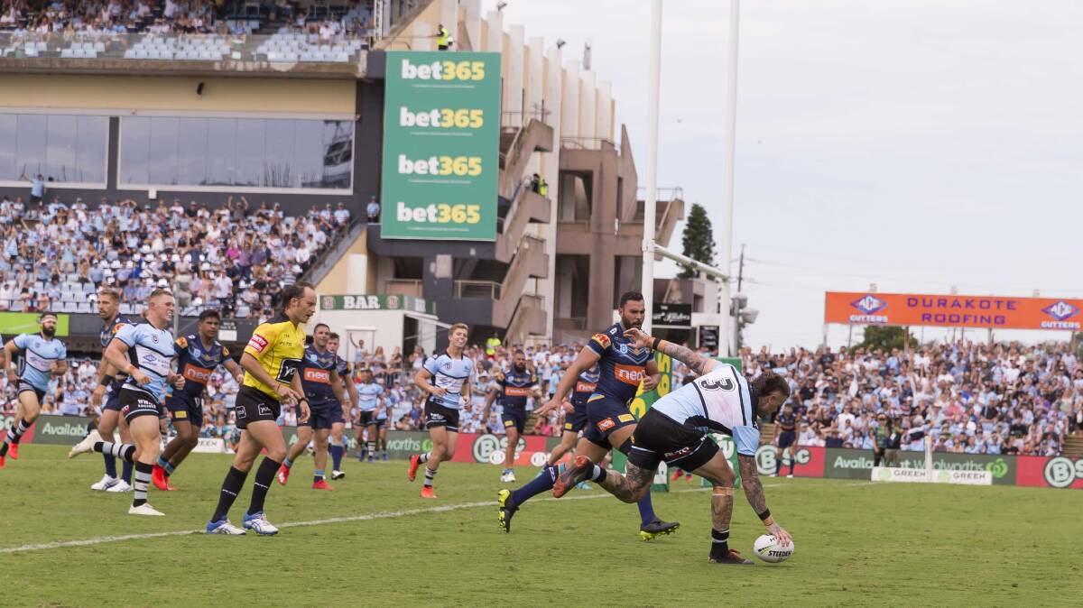 Try time: Josh Dugan scores for the Sharks. Picture: AAP Image