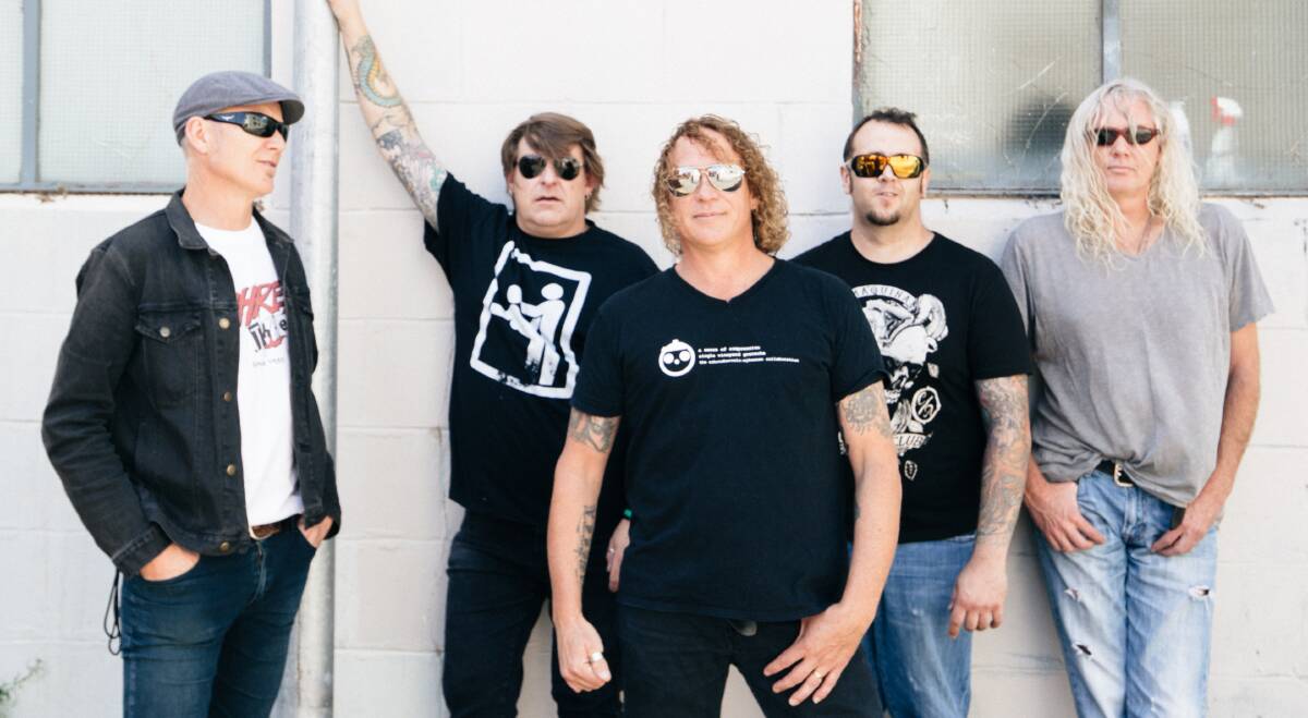 Still screaming: Front man Dave Gleeson (centre) will bring his band The Screaming Jets back to the area on Saturday night. Picture: Supplied