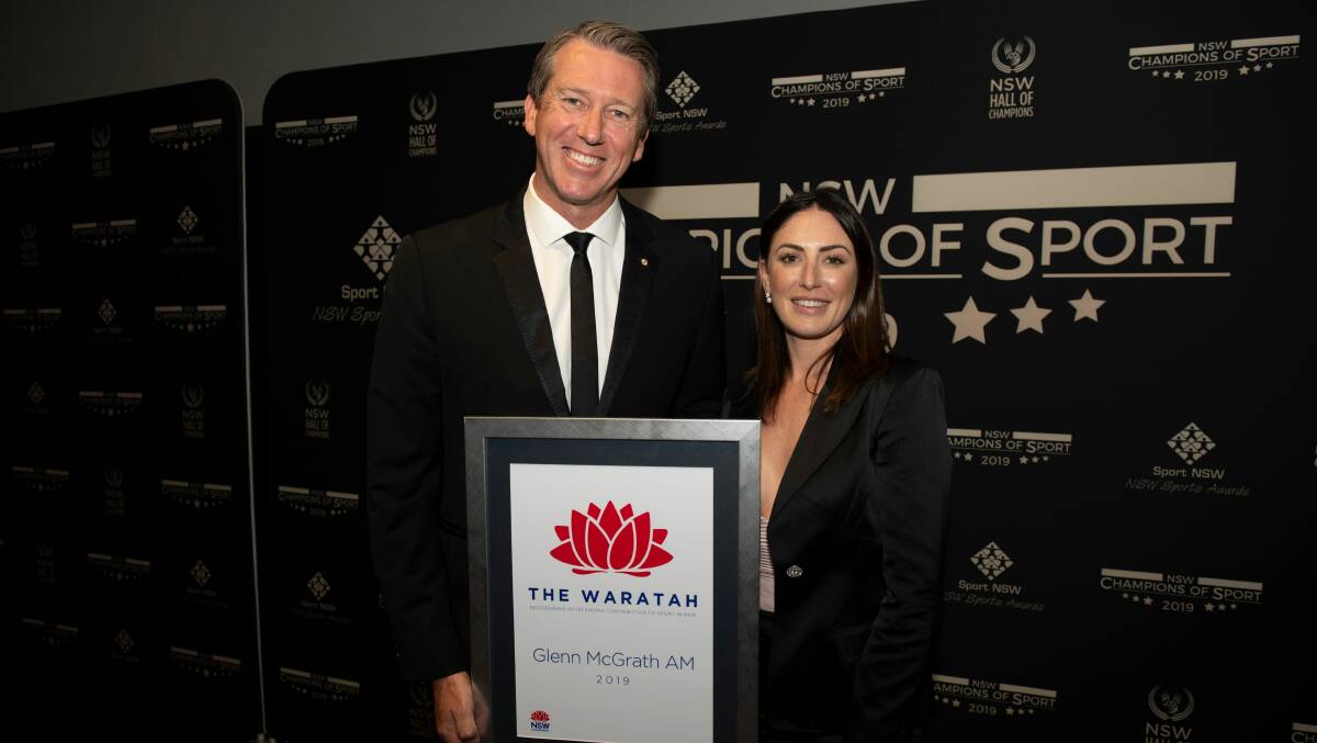 Honour: Glenn McGrath with his wife, Sara, at the dinner on Monday night where the Sutherland cricket legend was awarded The Waratah. Picture: Supplied