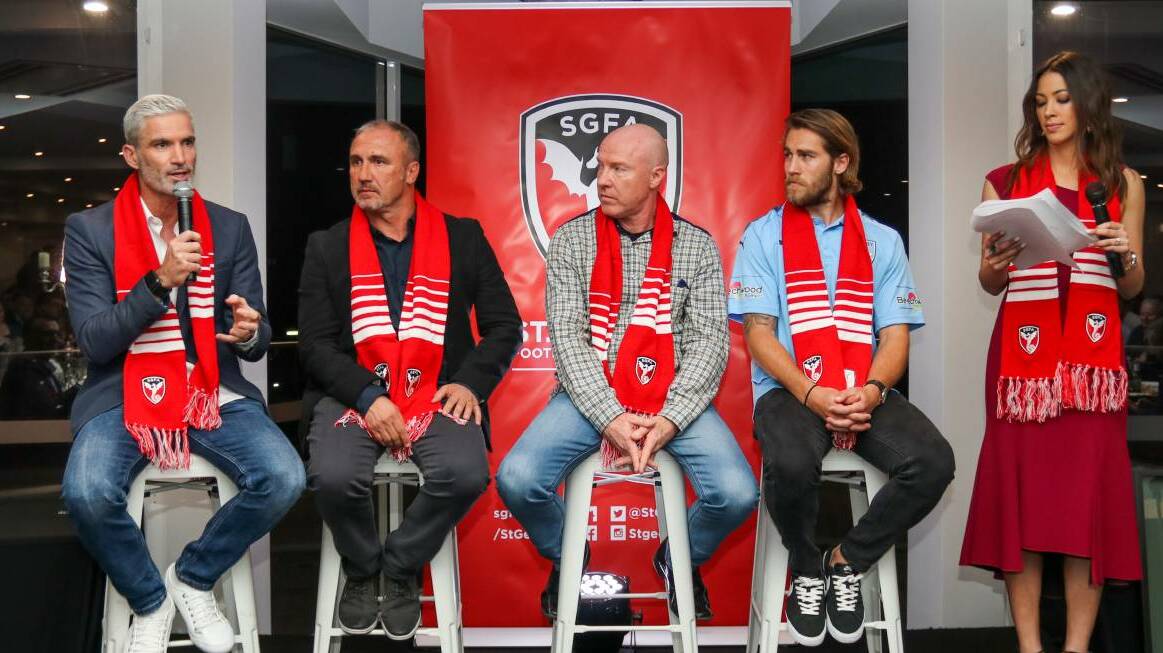 Ollerenshaw (centre) on stage with Craig Foster, Aytek Genc, Josh Brillante and Tara Rushton and St George Football Association's 2017 presentation night. Picture: Supplied