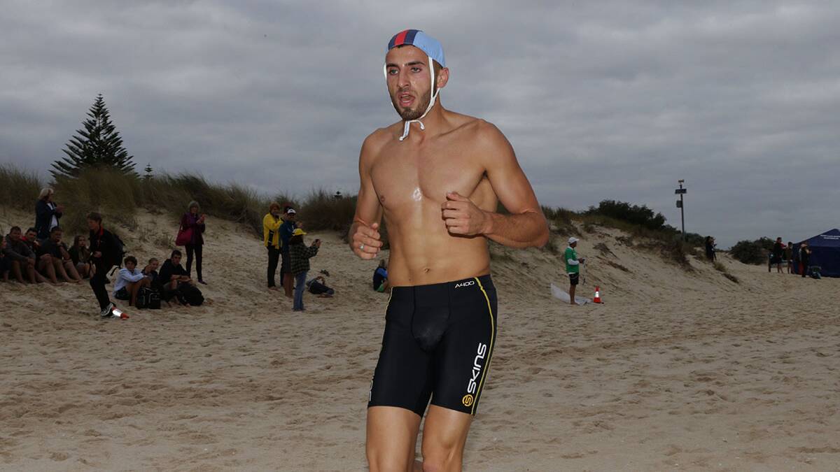 Champion: Ali Najem on his way to winning his third 2km beach sprint title at the Australian championships in Western Australia in May. Picture: John Veage