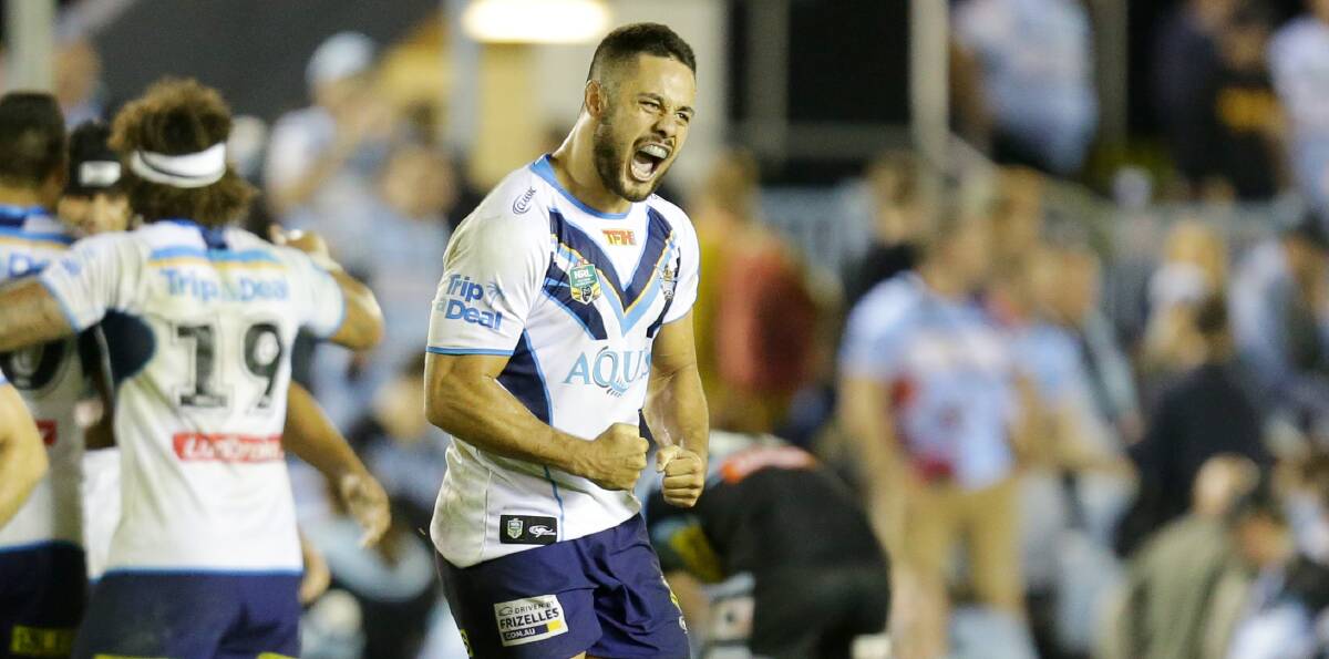 Not a Shark: Jarryd Hayne celebrates helping the Gold Coast Titans beat Cronulla at Southern Cross Group Stadium earlier this year. Picture: Chris Lane