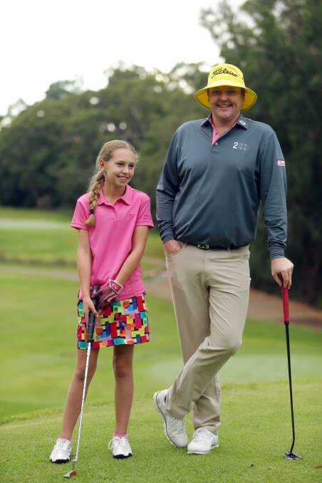Charlotte with PGA Tour professional golfer Jarrod Lyle at Kareela Golf Club.
