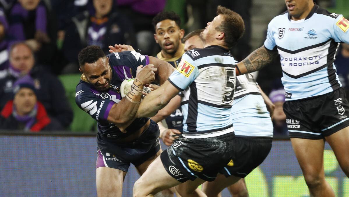 Ouch: Sharks centre Josh Morris suffered a badly broken nose against the Storm in Melbourne on Saturday night. Picture: AAP Image