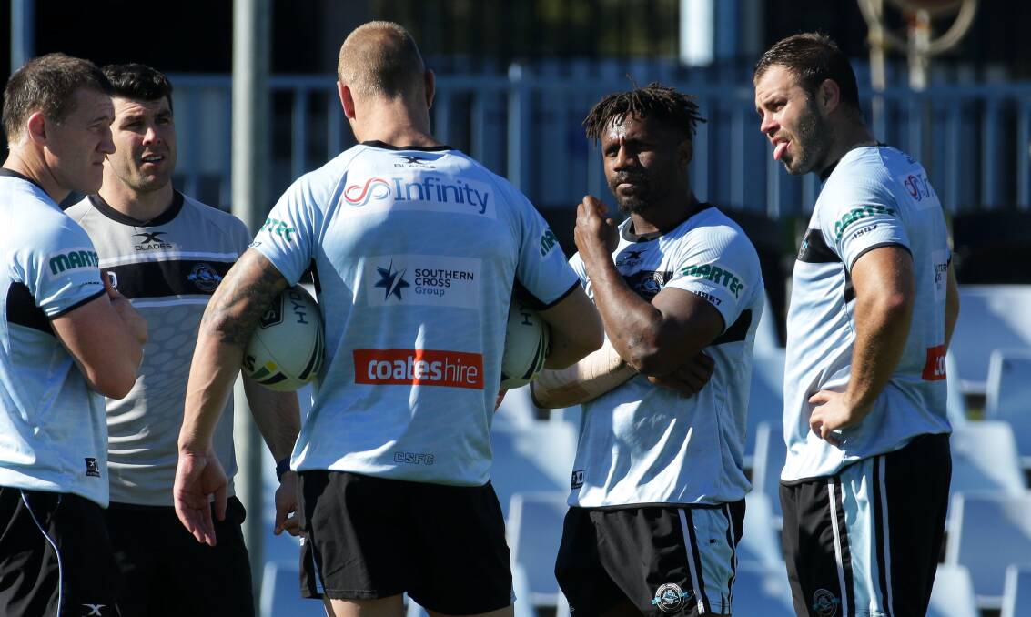 Brains trust: James Segeyaro (second from right) with Paul Gallen, Michael Ennis, Luke Lewis and Wade Graham at Sharks training on Tuesday. Picture: John Veage