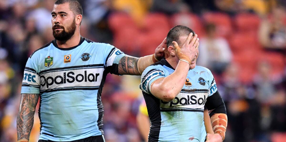 Tough night: Sharks prop Andrew Fifita (left) consoles Cronulla captain Paul Gallen after their 22-point loss to Brisbane on Friday night. Picture: Darren England/AAP Image