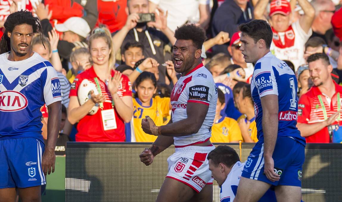 Try time: Dragons winger Mikaele Ravalawa celebrates his try against Canterbury at Kogarah on Sunday. Picture: AAP Image