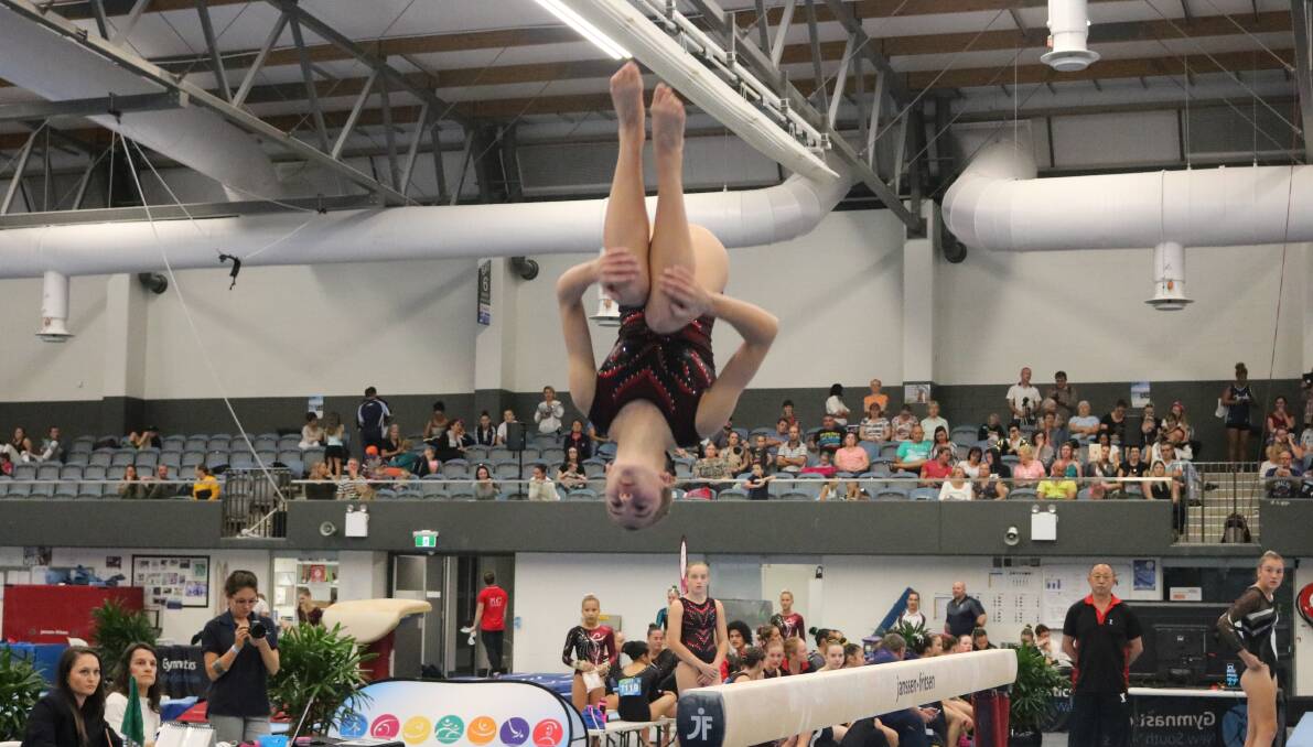 Skills: A Caringbah YMCA athlete in action. Picture: Gymnastics NSW