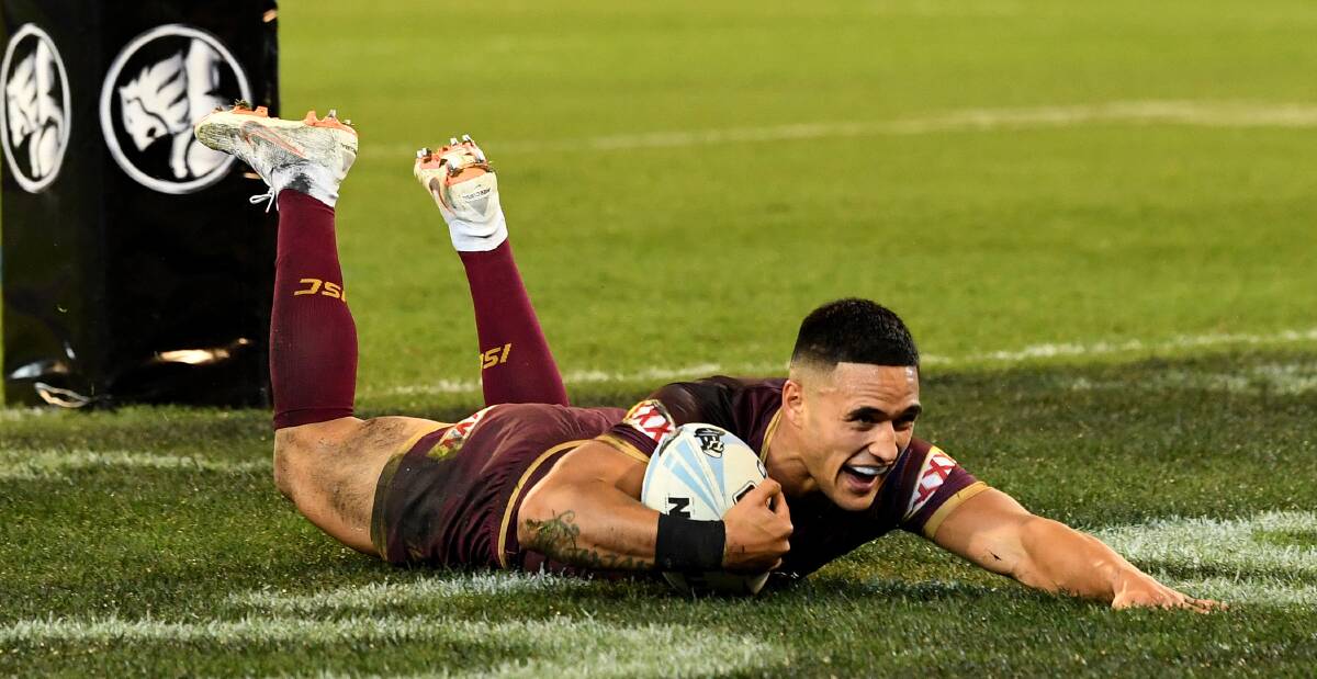 You can't catch me: Sharks winger Valentine Holmes was outstanding against NSW, scoring a 90 metre intercept try for Queensland in Origin I in Melbourne. Picture: AAP Image
