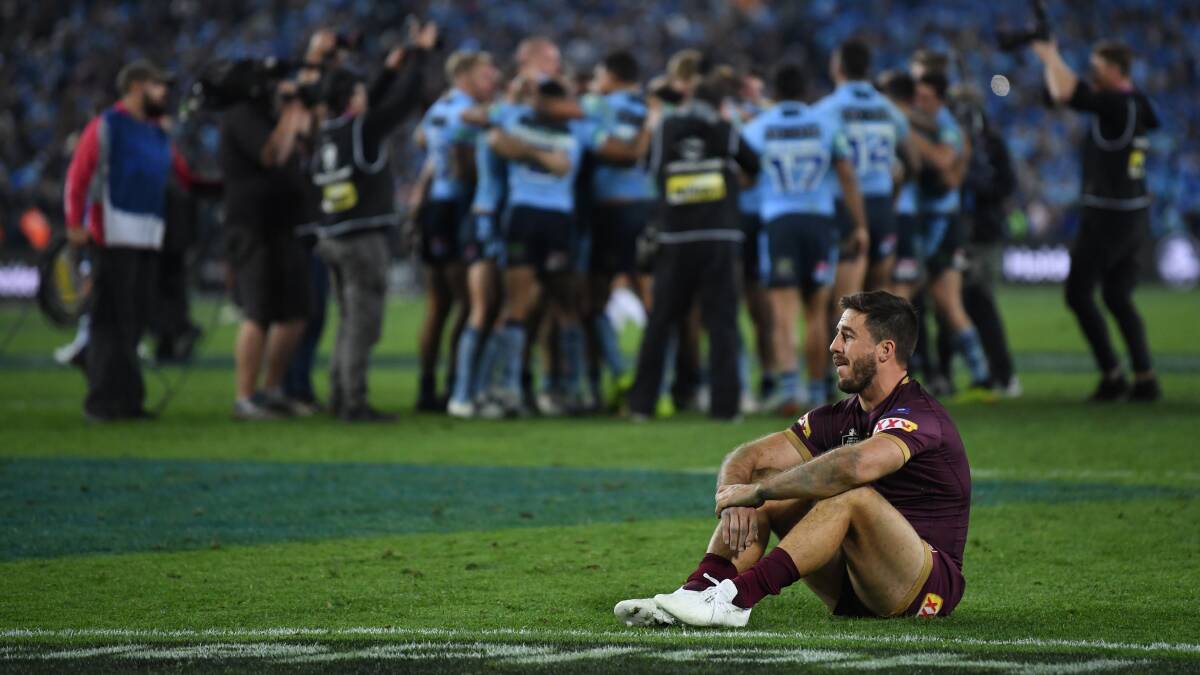 Dumped: A forlorn Ben Hunt reflects after NSW sealed a series win against Queensland in State of Origin II. Picture: AAP Image