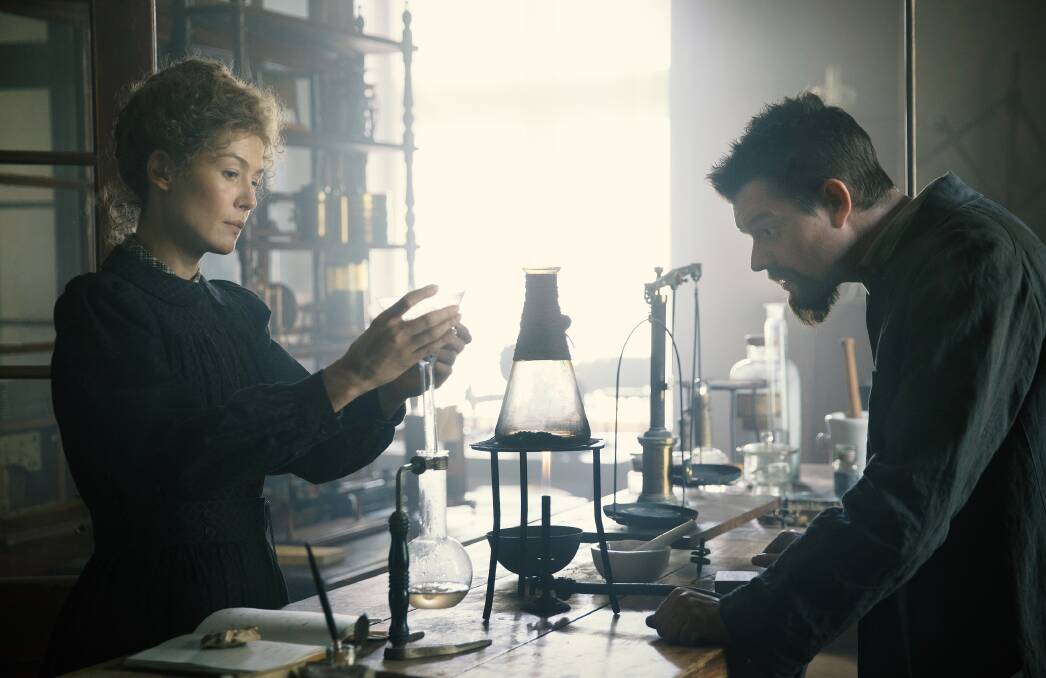 Icon: Rosamund Pike plays history-making scientist Marie Curie alongside Sam Riley as her husband Pierre Curie in new biographical film Radioactive, rated M, in cinemas now.