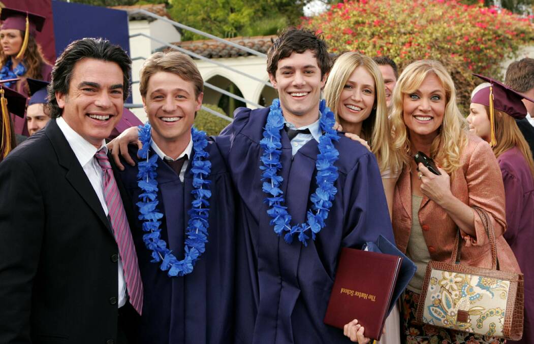 Peter Gallagher (Sandy Cohen), Benjamin McKenzie (Ryan Atwood), Adam Brody (Seth Cohen), Kelly Rowan (Kirsten Cohen) and Daphne Ashbrook (Dawn Atwood) in The OC. File picture