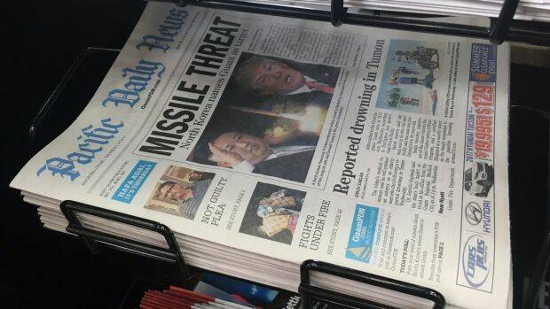 A copy of the local newspaper is for sale in Hagatna, Guam. Photo: AP
