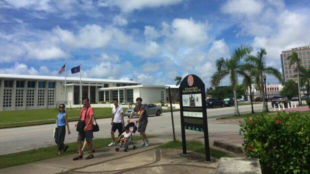 People walk around Hagatna, Guam. Photo: AP
