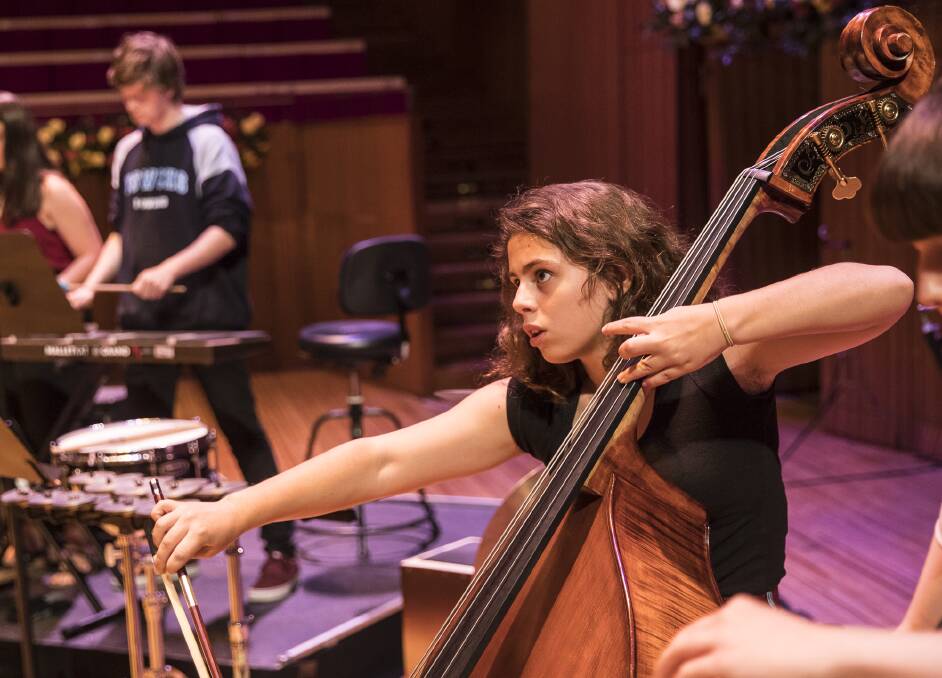 Young musician: St George Girls High School student Zoe Morris playing the double bass. Picture: Supplied