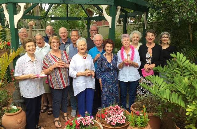 Perfomers: Members of the Sweet Violets pose for a photo. Founder Barbara Stacey is pictured wearing a pink lei. Picture: Supplied