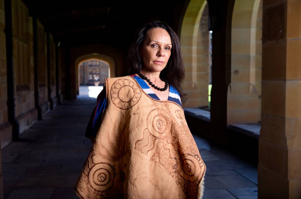 PROUD Wiradjuri woman: Portrait of Labor MP Linda Burney proudly wearing the cloak featuring her totems and the story of her life. Photo: Edwina Pickles