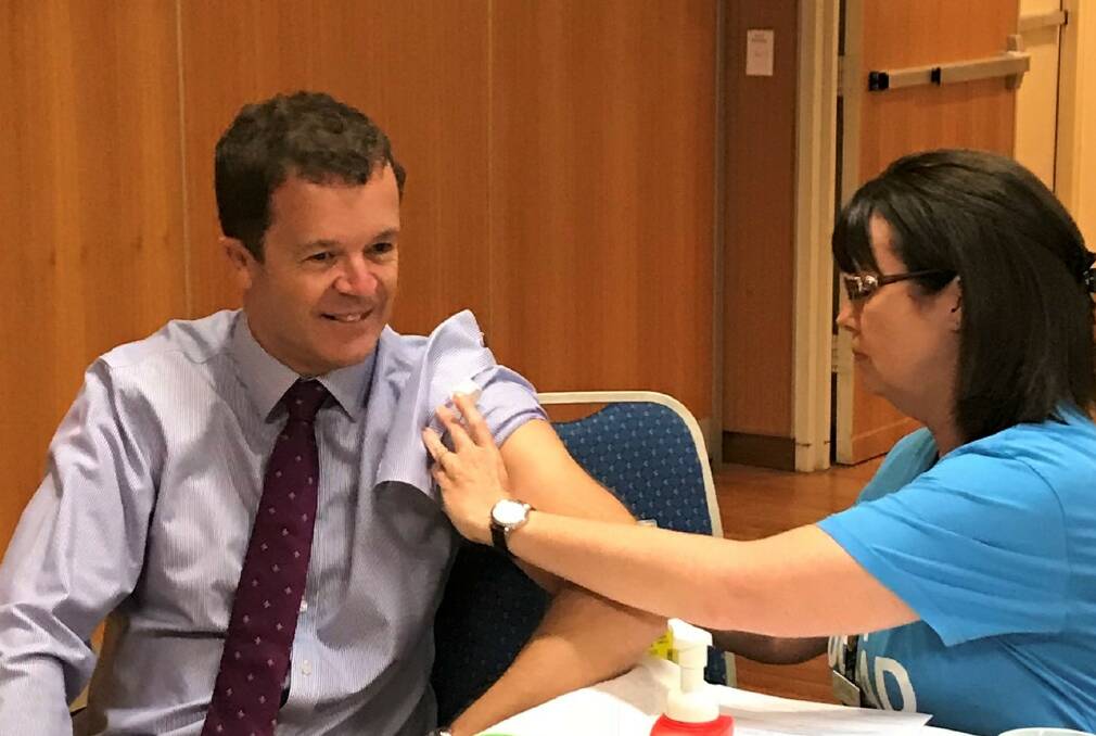 Mark Speakman MP getting a flu jab in Cronulla from the SE Sydney Local Health District in 2018. Picture: Supplied.