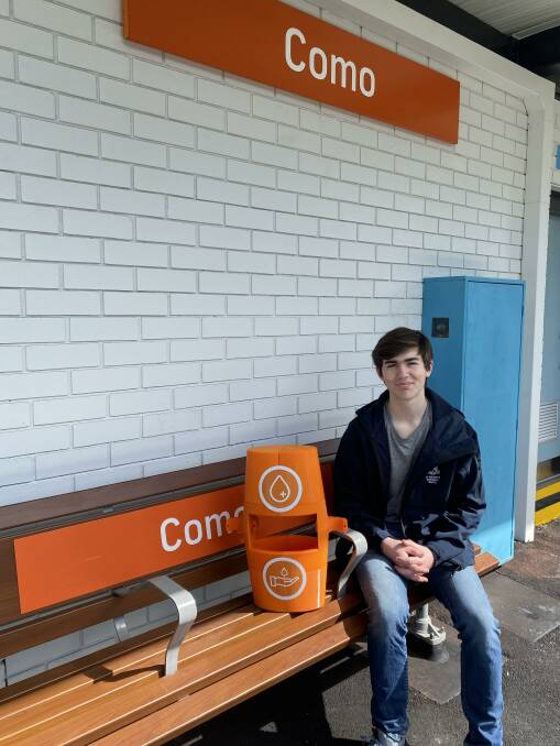 Travel safe: HSC student Nicholas Lewis, pictured at Como station with his The Station hand sanitising unit. Picture: Supplied