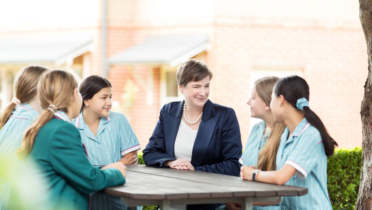 Mental health: Dr Emma Burgess (centre), Principal of Danebank Anglican School for Girls, has been implementing a 'visible culture' of wellbeing with her students. Picture: Supplied