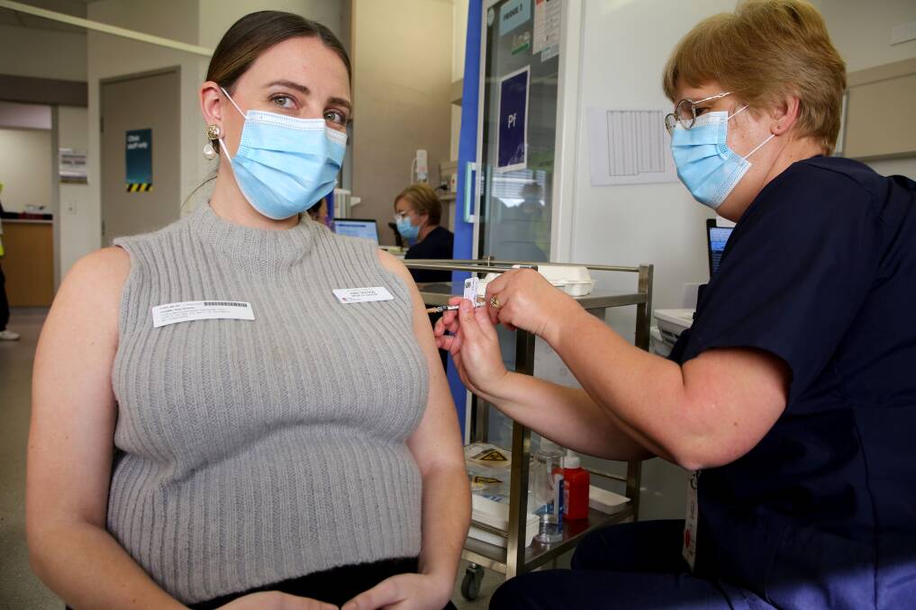 Leading the way: Dr Amy Manos is the first pregnant woman to be vaccinated at the St George Hospital Vaccination Hub and the first South Eastern Sydney Local Health District staff member who is pregnant to receive a vaccination. Pictures: Supplied