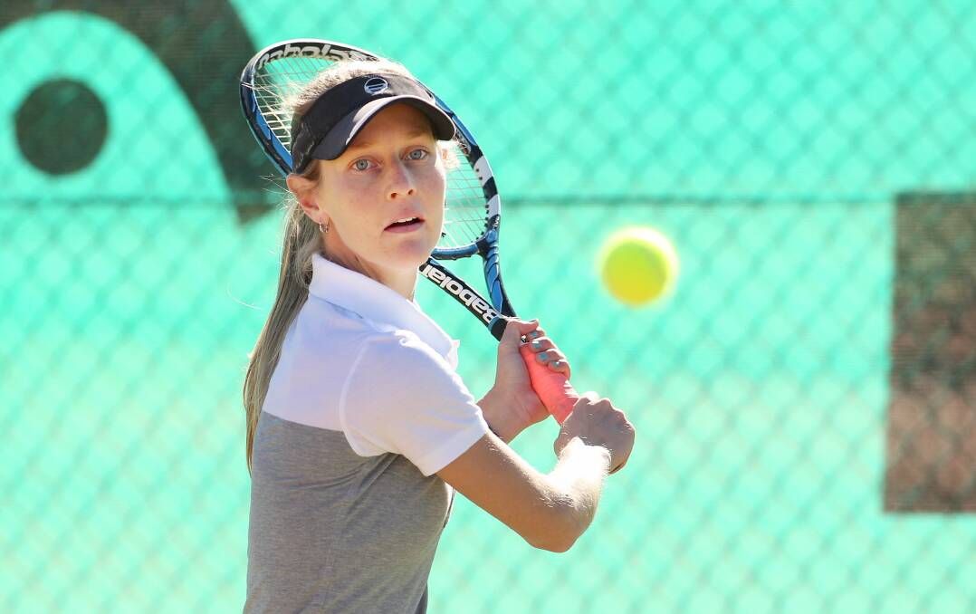 Emma Pollock playing in the women's singles final at the NSW country titles at District Park in 2012. 