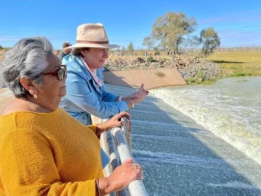 NSW Water Minister Melinda Pavey watches the flow with Joy Williams. Photo: Supplied
