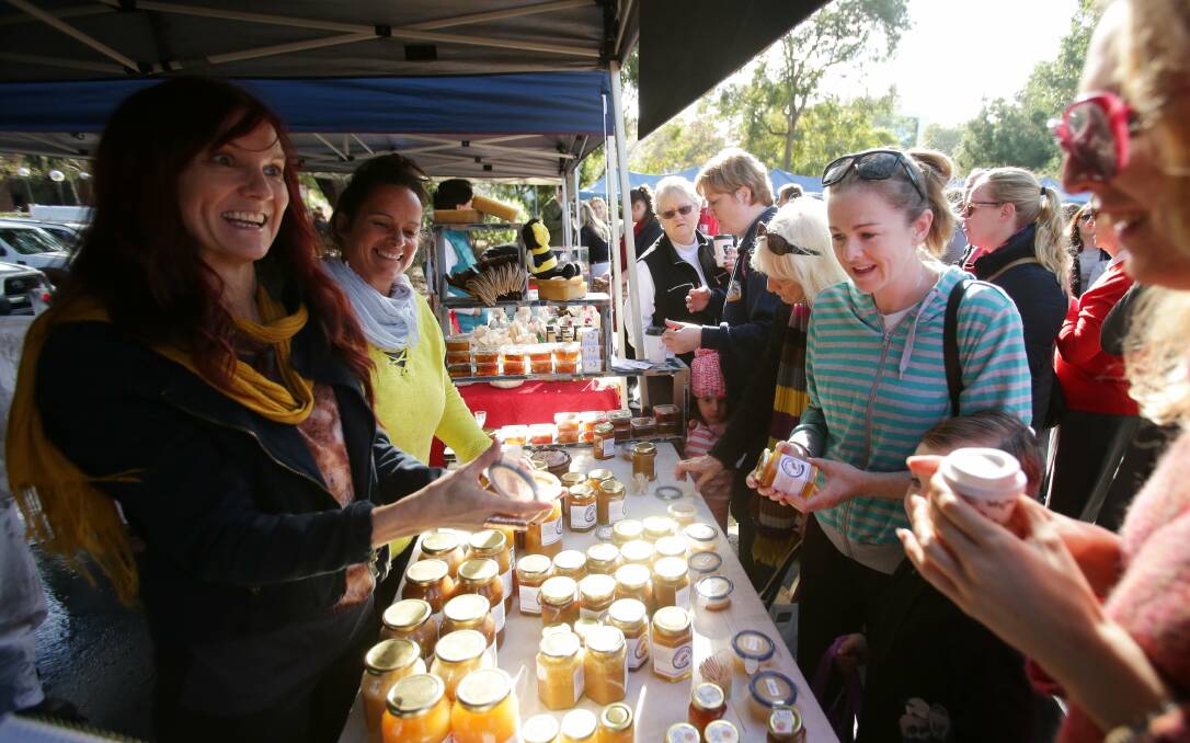 Treats: Shoppers flock to the Shire Farmers Market.