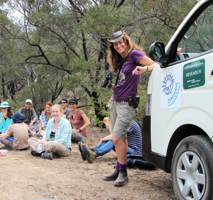 Janine Duffy (right) leads a group with Echidna Walkabout Nature Tours.