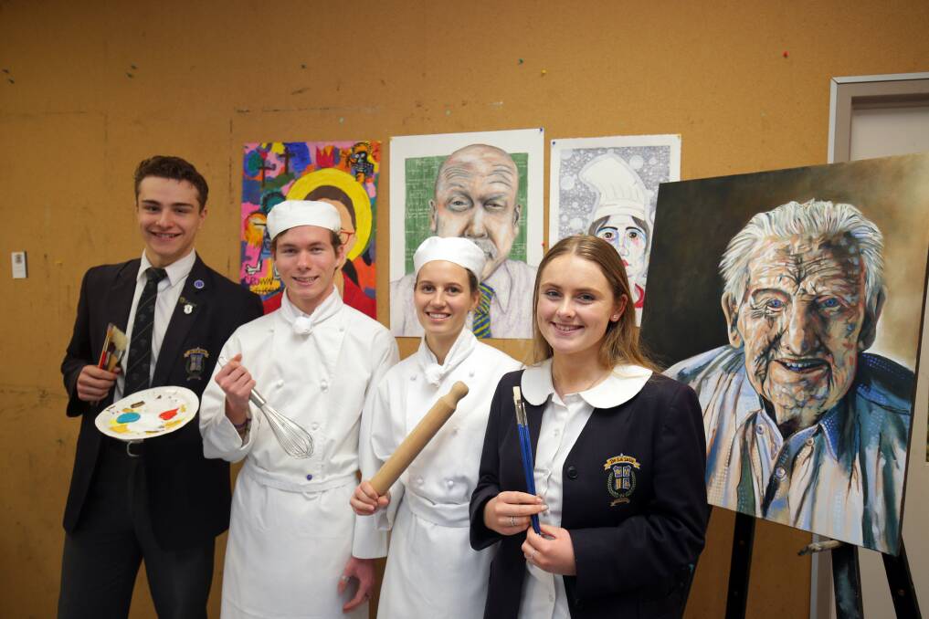 Creating careers: De La Salle Senior College Cronulla visual art students Adrian Lalic and Jasmine Cruise with hospitality students Tayla Kiss and Michael Hughes. Both subjects have jumped in popularity this year. Picture: Chris Lane