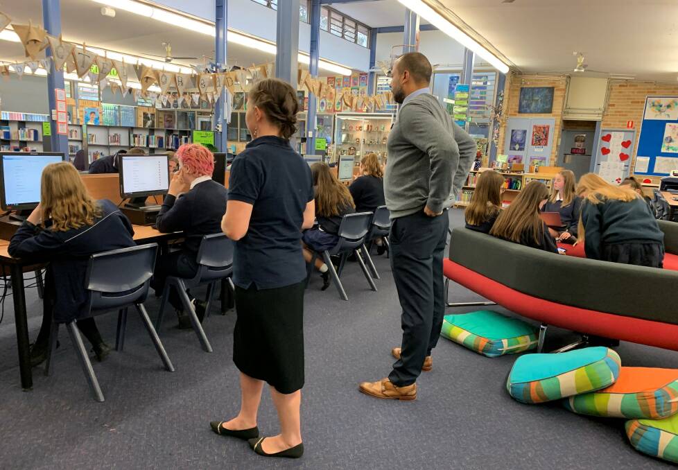 Focus on futures: Students take part in a careers workshop at Kirrawee High School, pictured with Jess Pollard from Career HQ and Ziad Mutasim from Southern Sydney Business Education Network. 