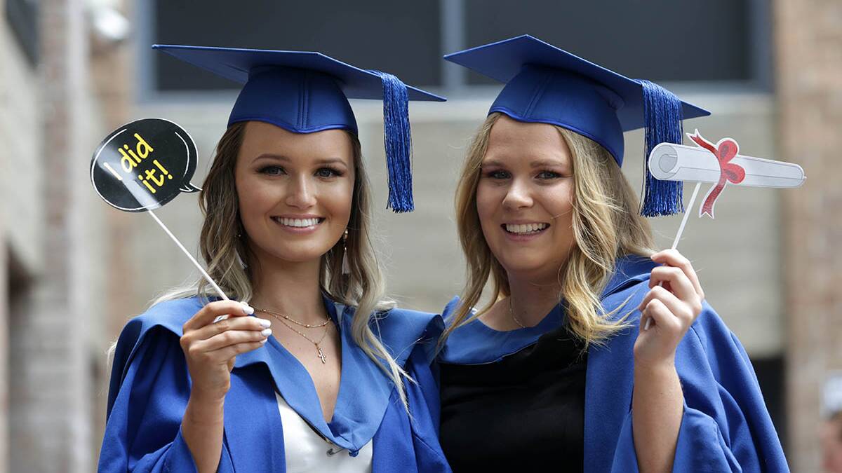 Degree pals: Jennifer Cook and Madison Shaw studied together at University of Wollongong Southern Sydney (Loftus campus). Picture: John Veage