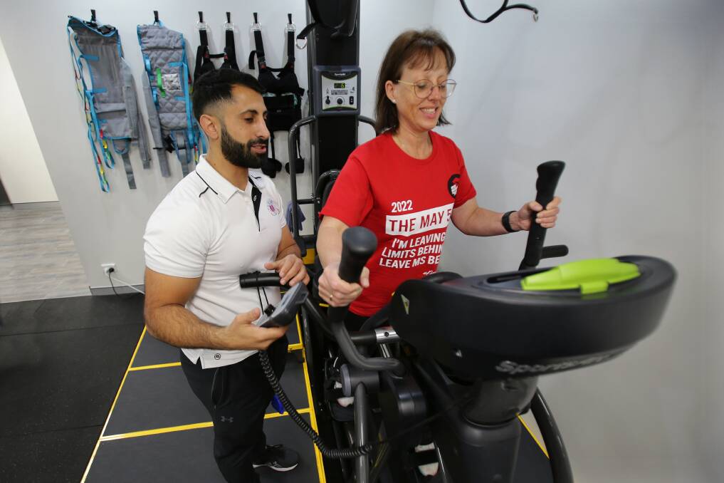 Repetitive motion: Exercise physiologist Amjad Saleh of Chronic Care Allied Health takes Debbie Bird, who has multiple sclerosis, through her steps. Picture: John Veage