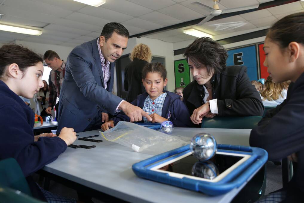 Future focus: Biomedical engineer Jordan Nguyen, pictured with Sutherland mayor Carmelo Pesce, with students in their new gemaker STEAM room.Picture: John Veage