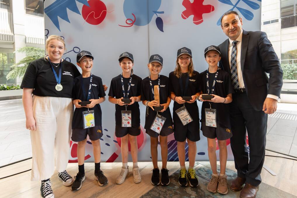 The team from Oyster Bay Public School with their teacher Ashley Napier, and Department of Education Secretary Murat Dizdar. Picture supplied