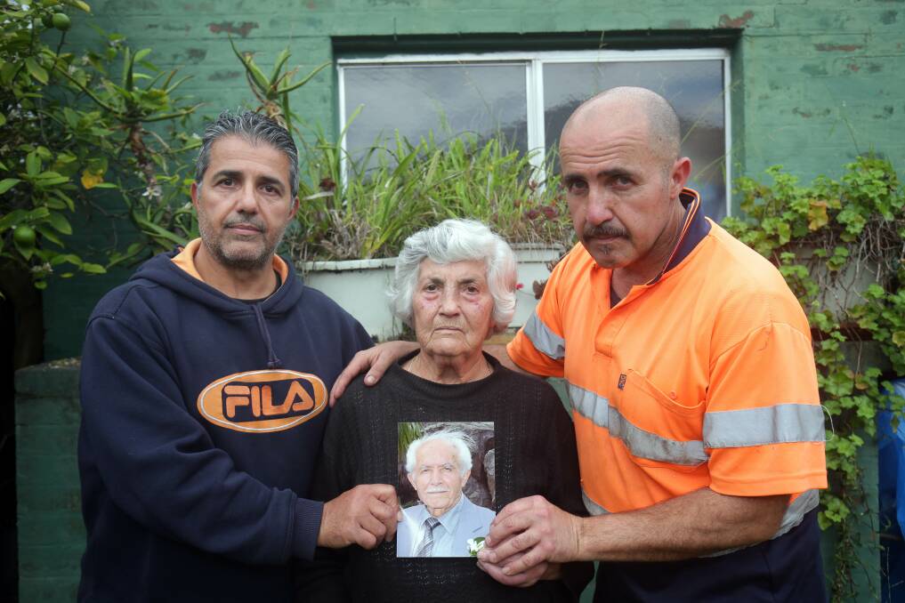 Grieving: Brothers Chris and John Epsimos with their mother Toula, are still struggling over the loss of their loved one, Sam, who died of a head injury while in an aged care home. Picture: Chris Lane