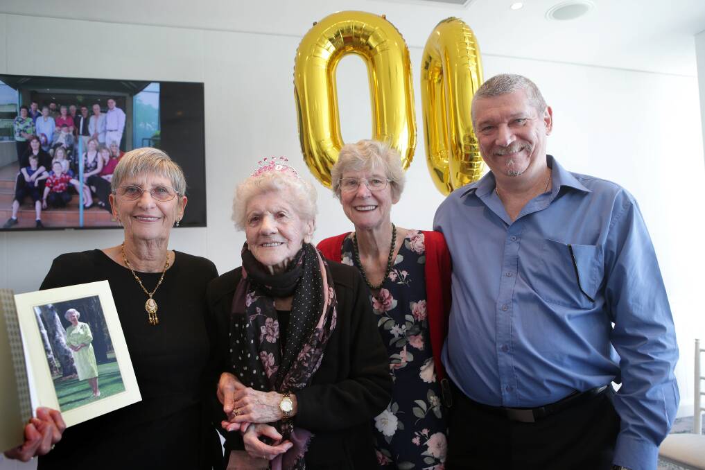 Happy hundred: Ruth Mary Parker celebrates her milestone with children Christine Gallagher, Pam Doniger and Peter Parker. Picture: John Veage